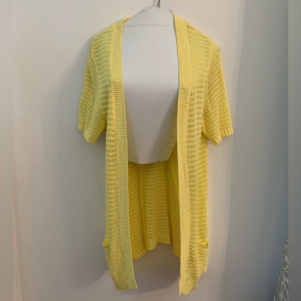 Pale yellow short sleeve cardigan cover up. Size Medium.